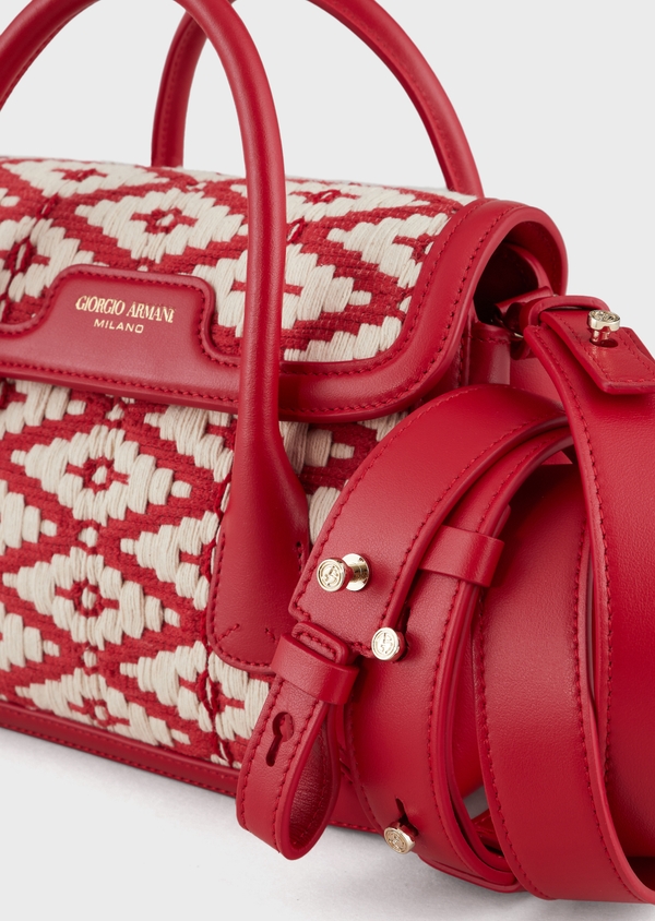 Bolsa pequena La Prima de couro e detalhes tran ados